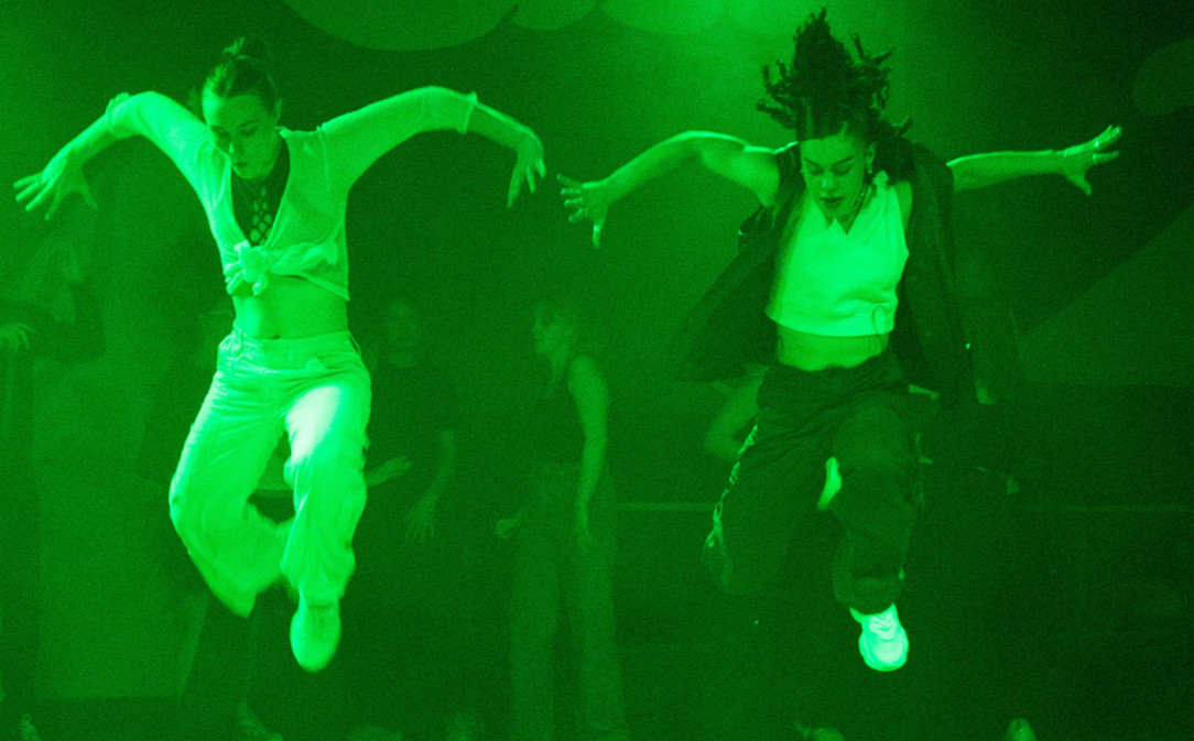 Two girls dancing in a nightclub