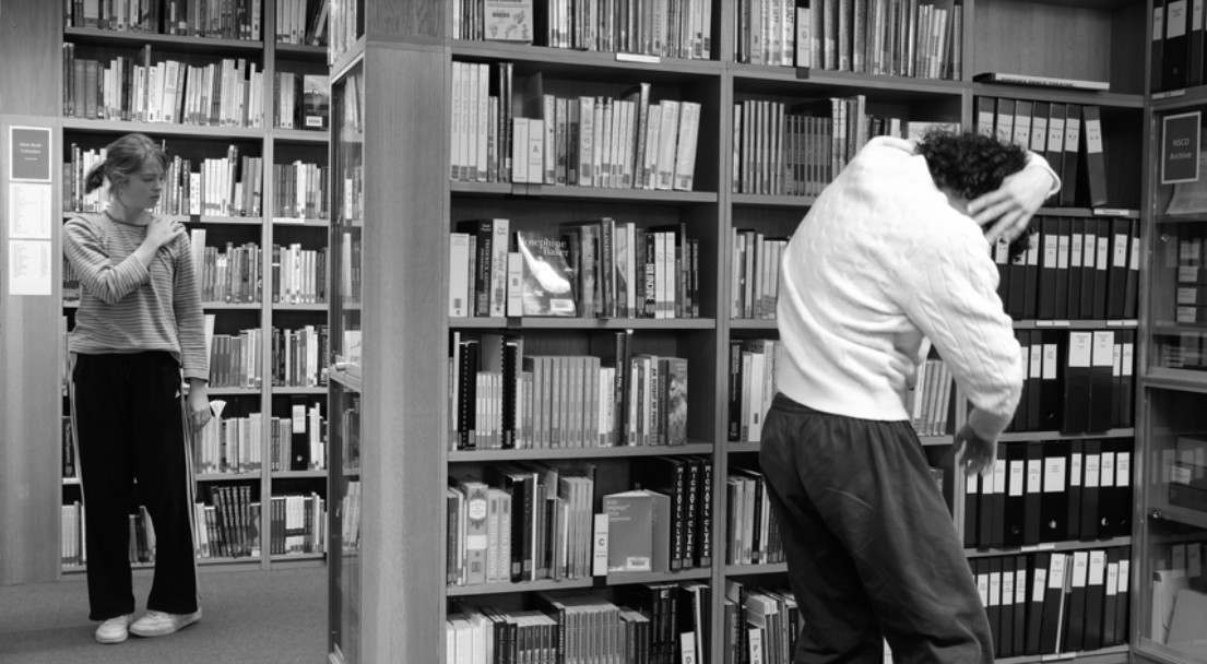 Dancers in a library