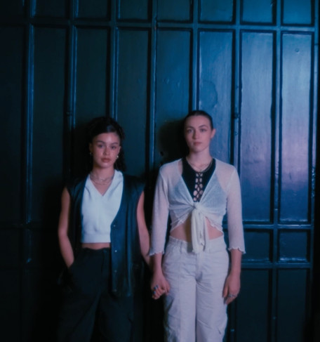 Two girls dancing in a nightclub